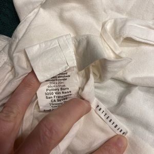 Two white pottery barn pillow cases